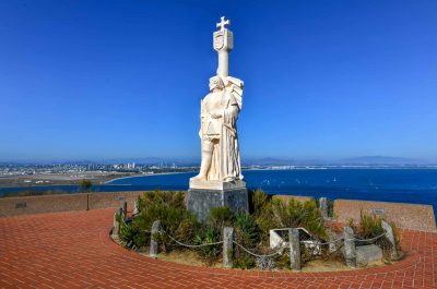 Juan Rodriguez Cabrillo statue and panorama of San Diego, California.